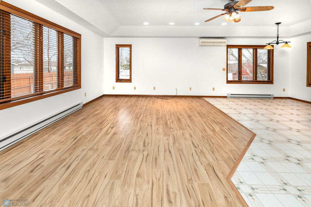 Back living room opens to dining & kitchen