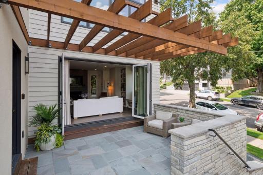 Open your living room window wall and bring the outdoors in