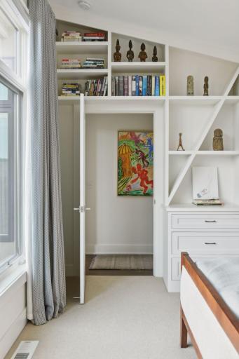 Built-in shelving in keeping with the sleek design of the home