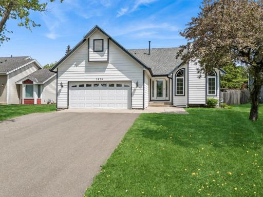 Welcome to 3876 Westbury a beautiful home that greets you with fresh white siding, architectural details, and a welcoming front entry and front patio.