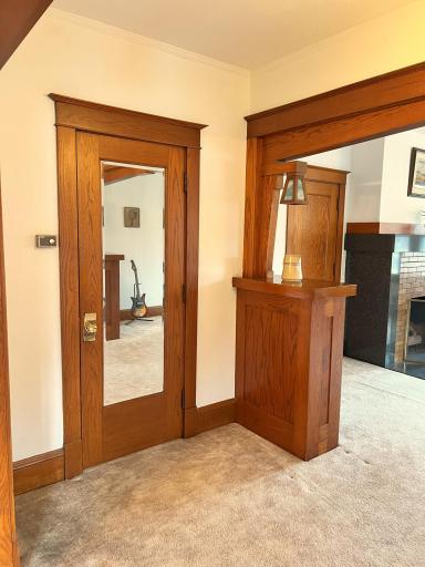 9 Foyer separating Formal Dining and Living room.jpg