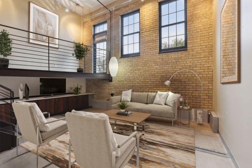 * Virtually staged photography. The sunken living room is accented with a stunning brick wall with large windows for natural light.