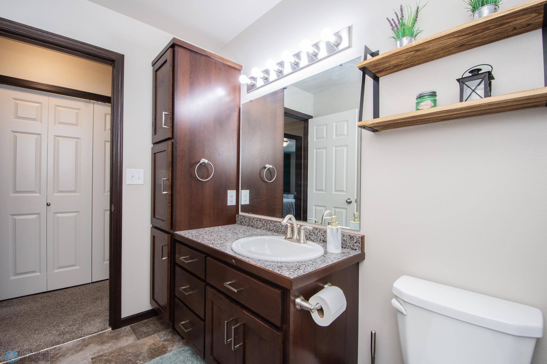 Upper full bath storage