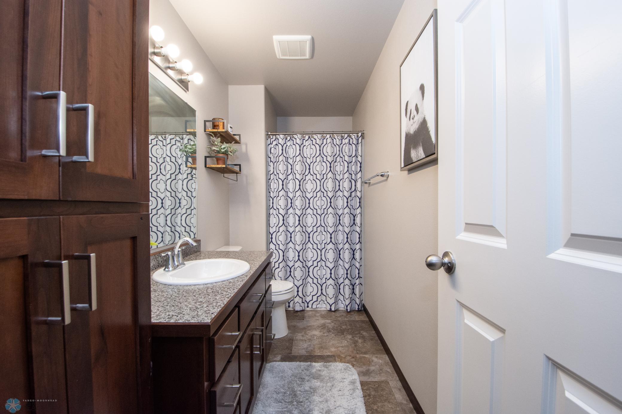 3rd lower 3/4 bath