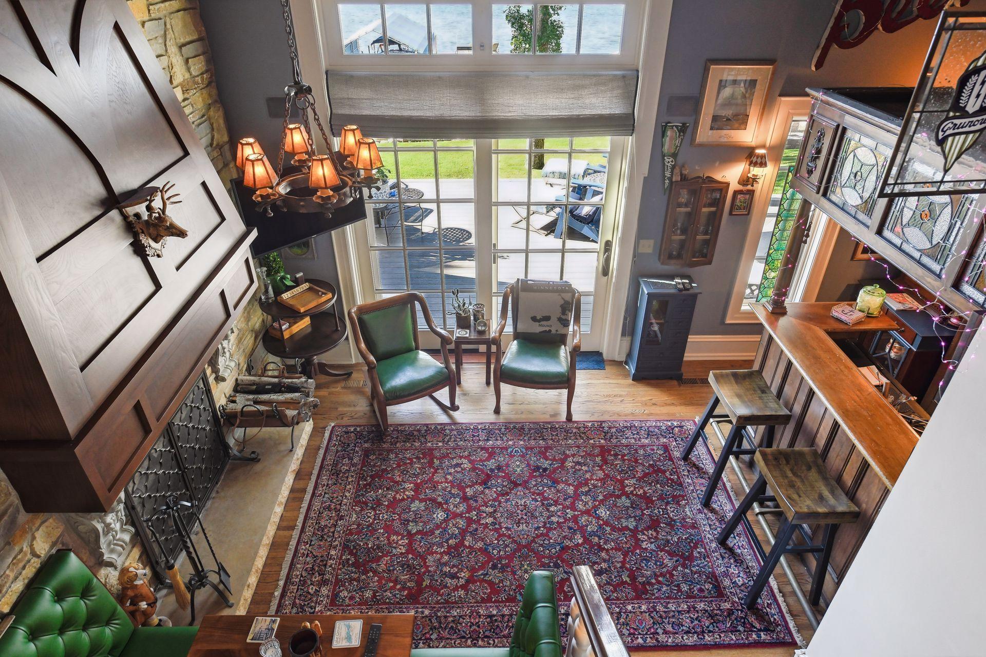 Pub Doors lead to outdoor patio /grill