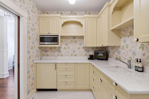 The space also features a Kitchenette with a Sub-Zero beverage refrigerator and GE microwave - plug in your coffee maker and enjoy easing into your day.