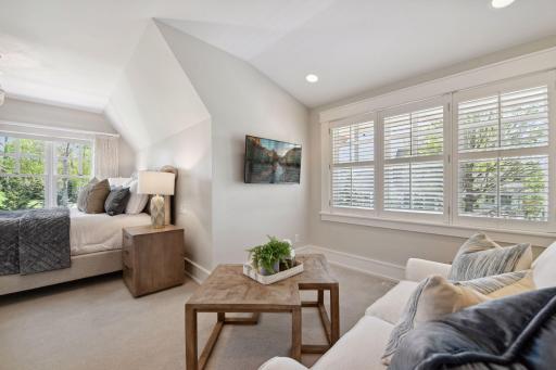 The space also features a relaxing sitting room.