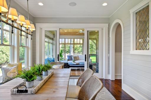 The Sun Room opens into the inviting Screen Porch.