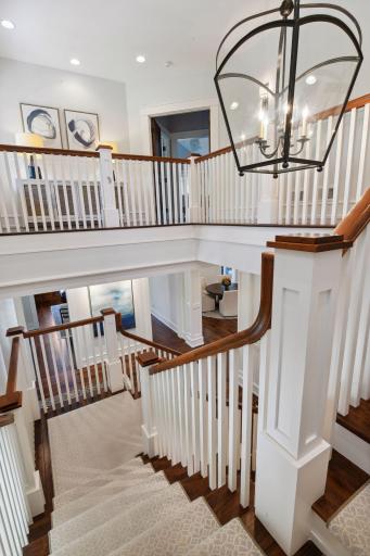 Wide staircases lead you the upper level.