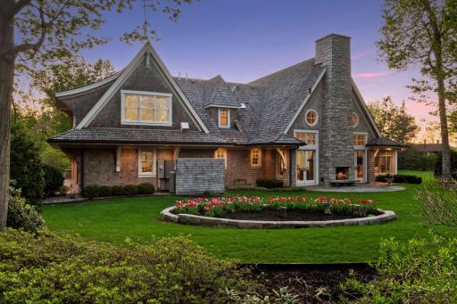 The home is surrounded by gorgeous landscaping designed by Gustafson Design and featured on the Arboretum Garden Tour.
