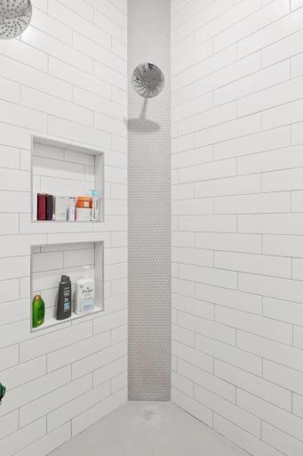 Walk-in tiled shower with dual shower heads
