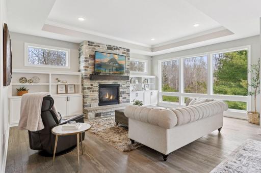 Inviting main floor living room with box vault ceiling