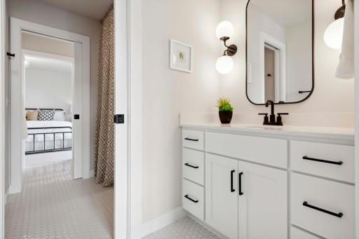 Bedroom 2 & 3 with Jack n Jill bathroom in between. Photos, virtual/video tours may not depict actual home. Features, materials & finishes shown may contain options that are not included in the price.