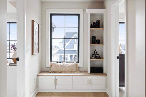 Another Robert Thomas Home Sold Before Print! Lovely window seat and bookcase at 2nd floor hallway! Photos, virtual/video tours may not depict actual home. Features, materials & finishes shown contain options that are not included.