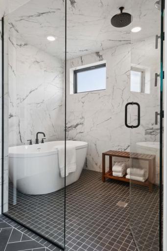 Luxurious Spa-like Owner's Bathroom. Photos, virtual/video tours may not depict actual home. Features, materials & finishes shown may contain options that are not included in the price.