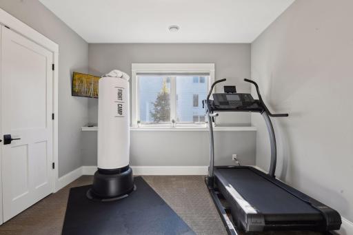 Conveniently located exercise room in the lower level that could be used as an additional bedroom