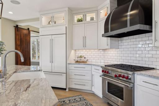 Beautifully lit compartments above the cabinets, perfect for showcasing your favorite dÃ©cor pieces.
