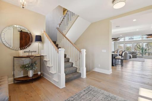 Make your way to the upper level to discover the inviting bedrooms and dedicated laundry area