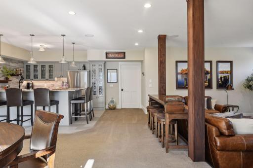 Seamlessly transition from the living room to the lower-level kitchen