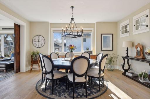 Light filled formal dining space off of the kitchen.