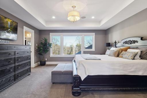Discover the serene and spacious primary bedroom.