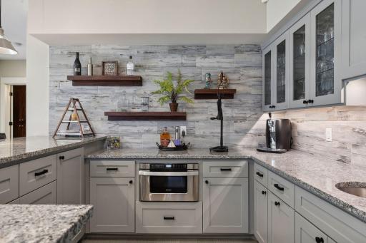 Floating shelves provide display options and extra storage