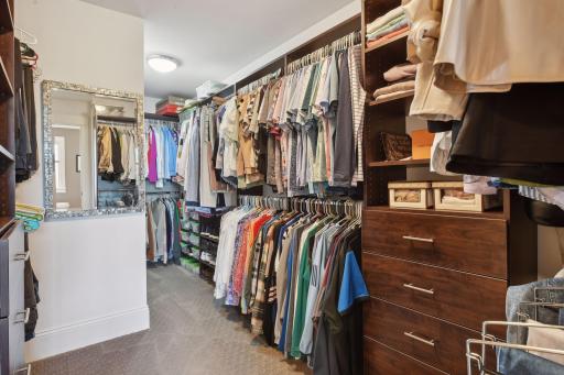 Primary bedroom walk-in closet offers ample space