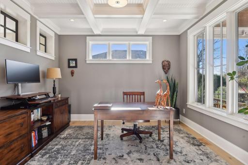 Conveniently located right off the entryway, this office space is filled with natural light