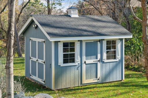 Private shed provides added convenience and extra space for all your storage needs.