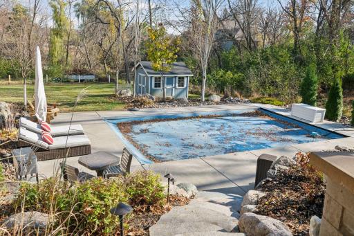Heated in-ground pool, perfect for refreshing splashes during the summer heat.
