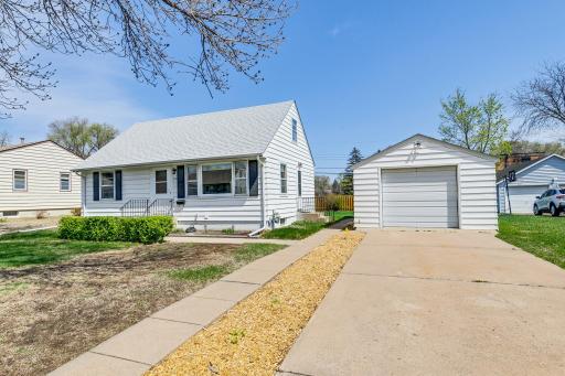 Your concrete drive and sidewalk invite you to discover your next home!