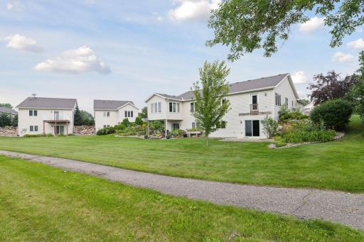 A spectacular setting with a walking trail in your backyard! Privacy - green space too! Welcome Home!