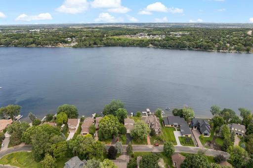 Aerial view of Lower Prior Lake, with home in foreground center. Breathtaking 180-degree views of Lower Prior Lake.