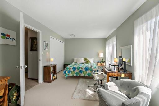 The other upper level bedroom has an overabundance of room and closet space.