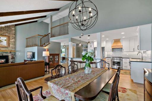 Where modern elegance meets lakeshore charm with cedar beams, red oak hardwood floors.