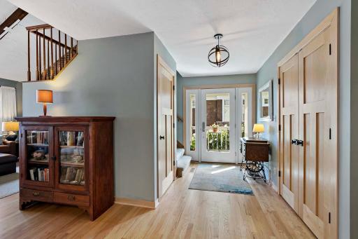 Enter the home onto oak hardwood floors.