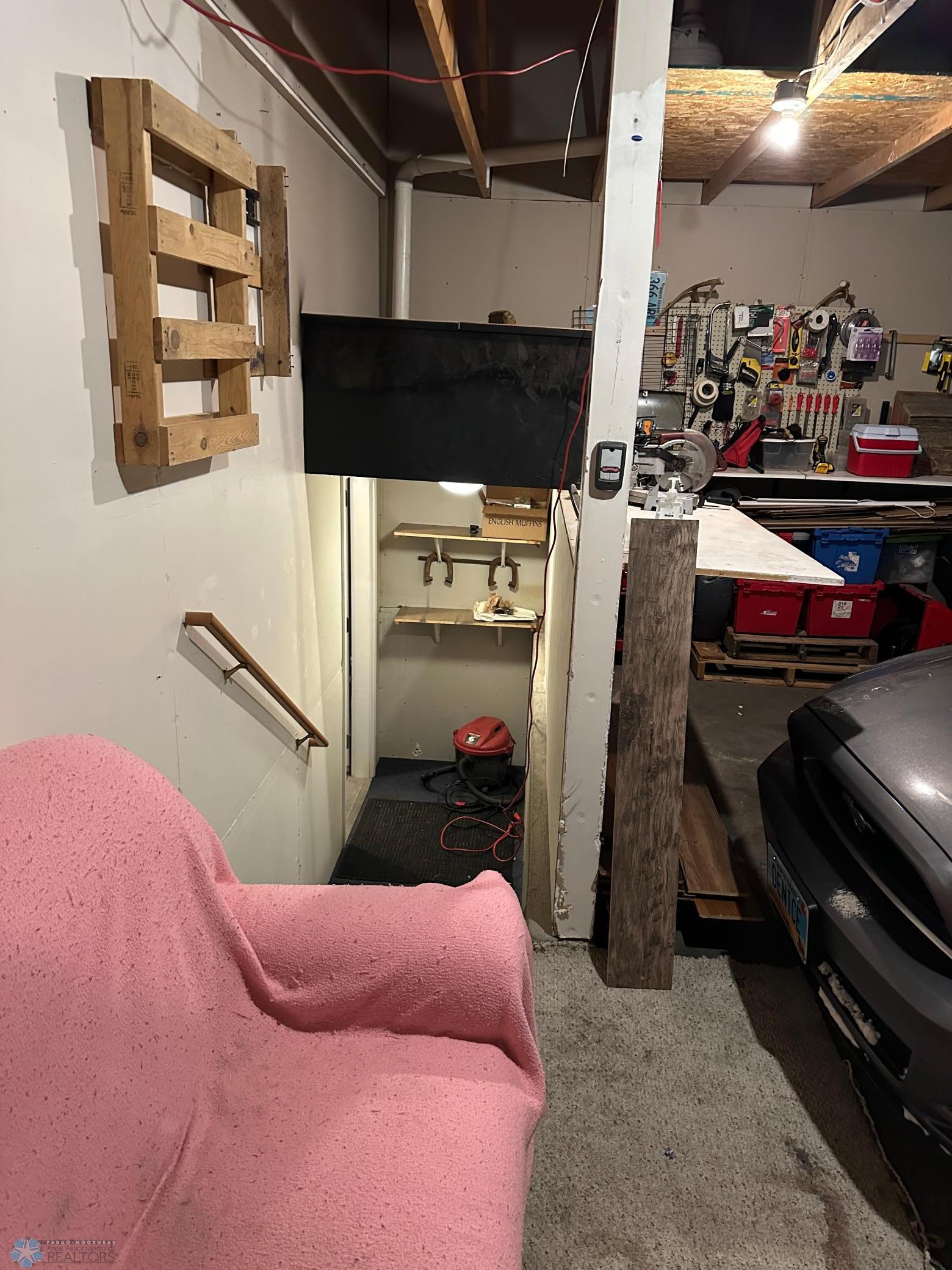 Stairway to lower level from garage