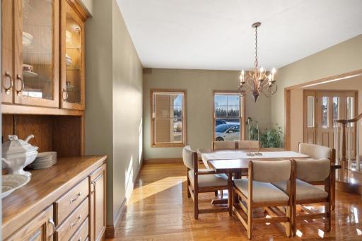 The formal dining room strikes the perfect balance between warmth and refinement.