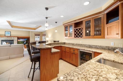 A beverage fridge, wine rack, and dishwasher ensure everything you need is at your fingertips.