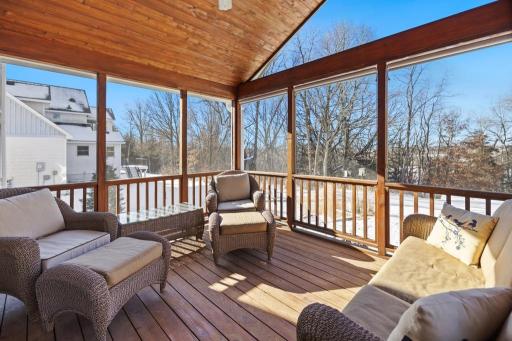 Step outside to the screen porch, where time slows down and the world feels a little quieter.