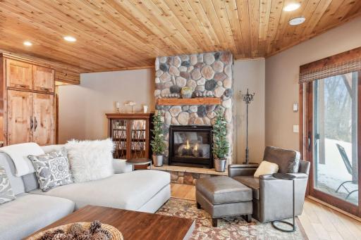 Walk-out Level Family Room Stone Fireplace