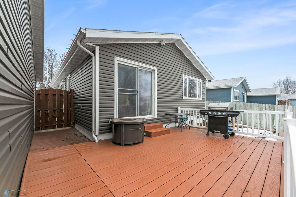 Back patio leads onto Maintenance-free Deck