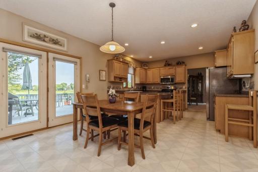 Eat in kitchen leads to the large deck for easy outdoor entertaining.