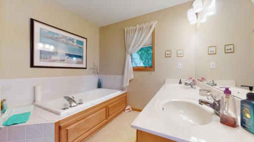 Owner's suite includes a separate tub and shower.