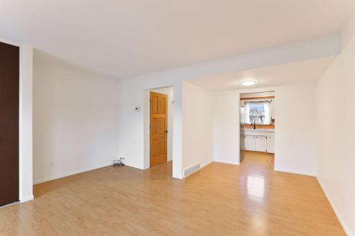 Living room and dining room with small nook for desk