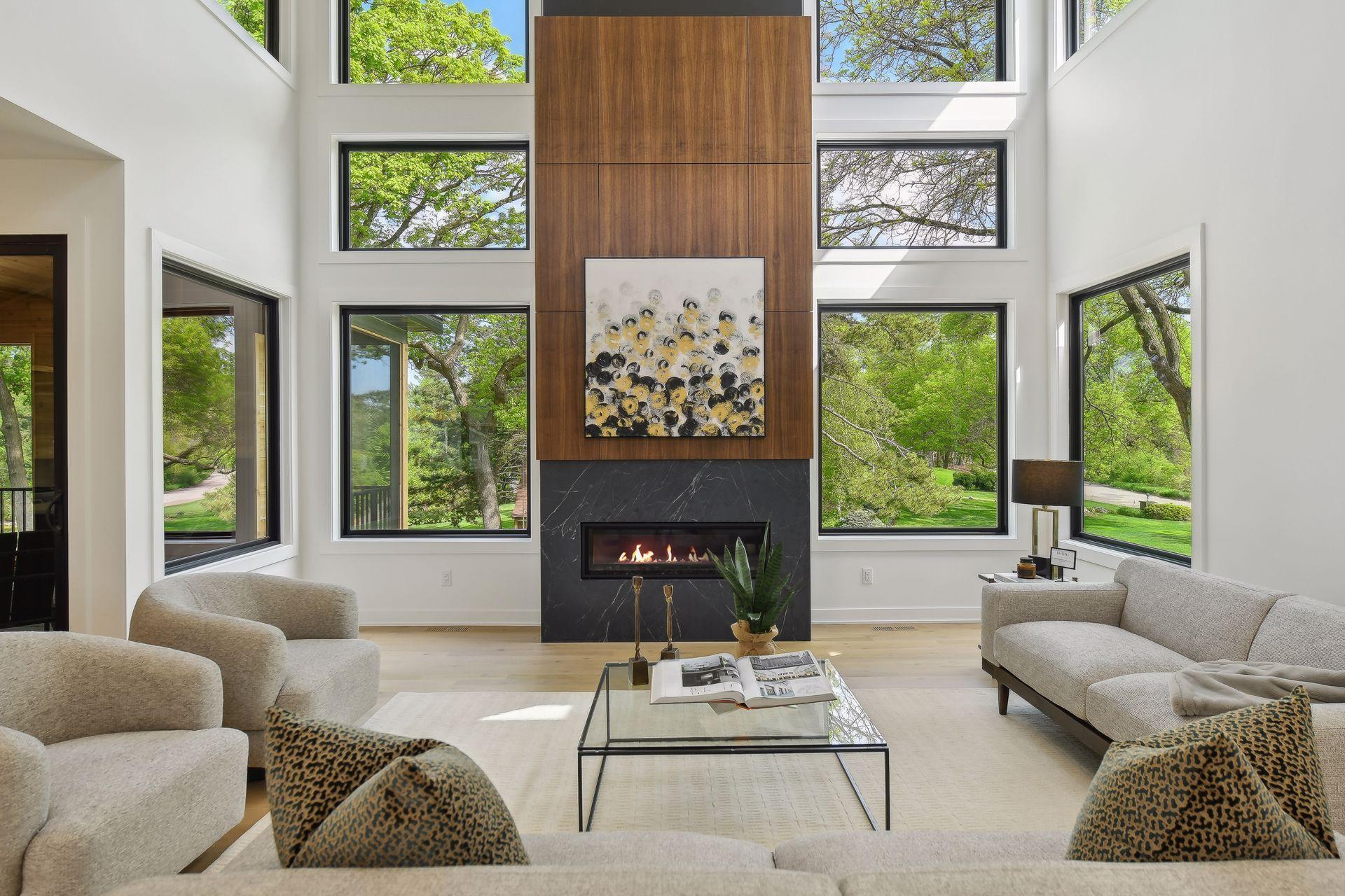 Floor to ceiling custom designed windows offer breathtaking pond views.