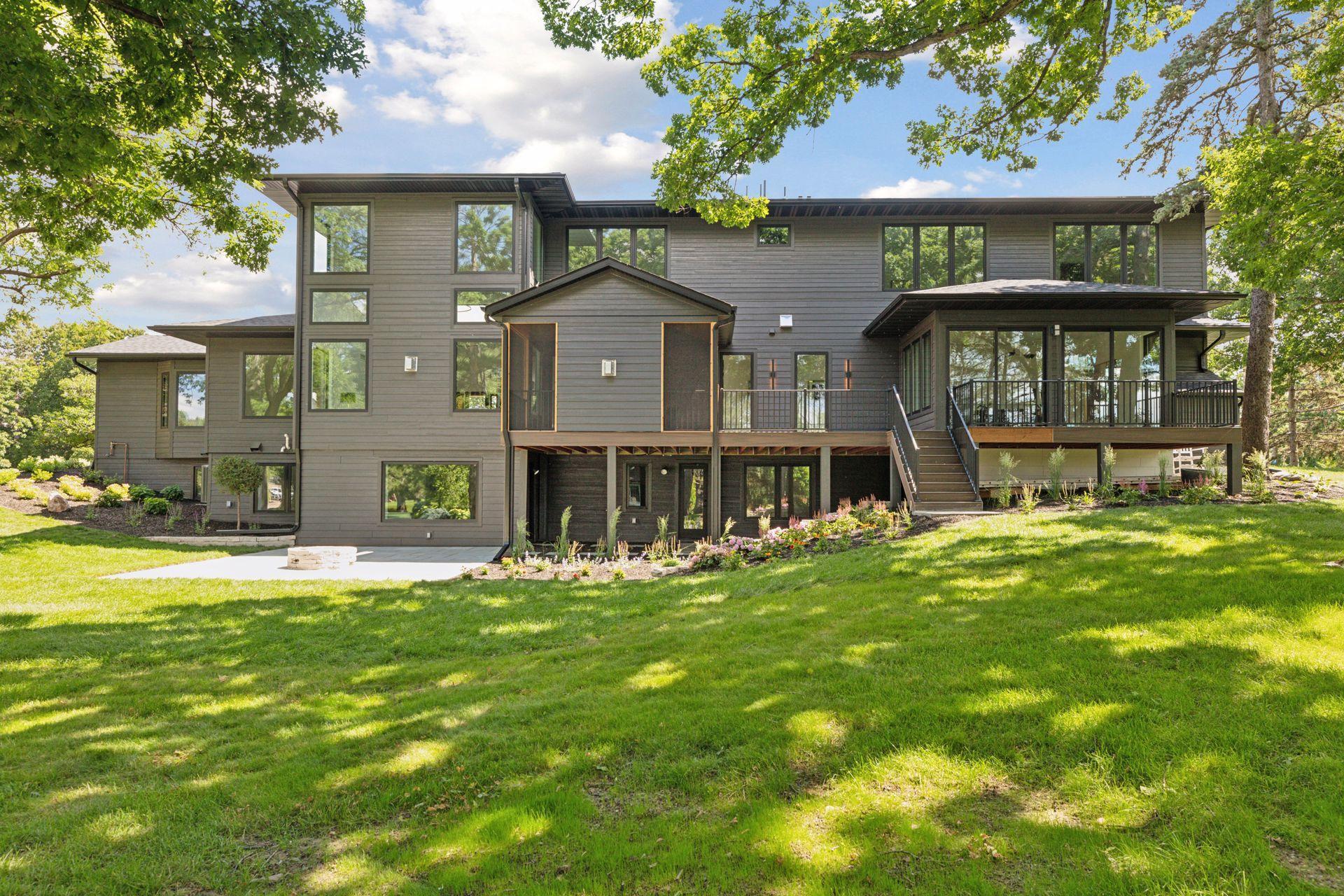 Private outdoor oasis features beautifully landscaped gardens and spacious patio.