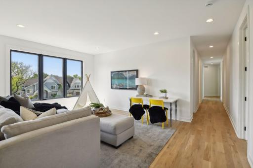 An upper family room space is perfect for gathering, studying or creating another entertainment space