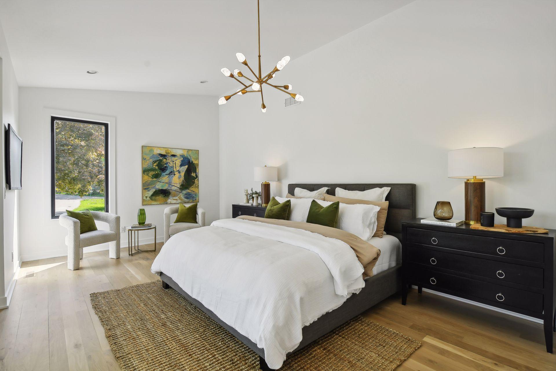 Primary suite offers luxury and tranquility with serene water views.