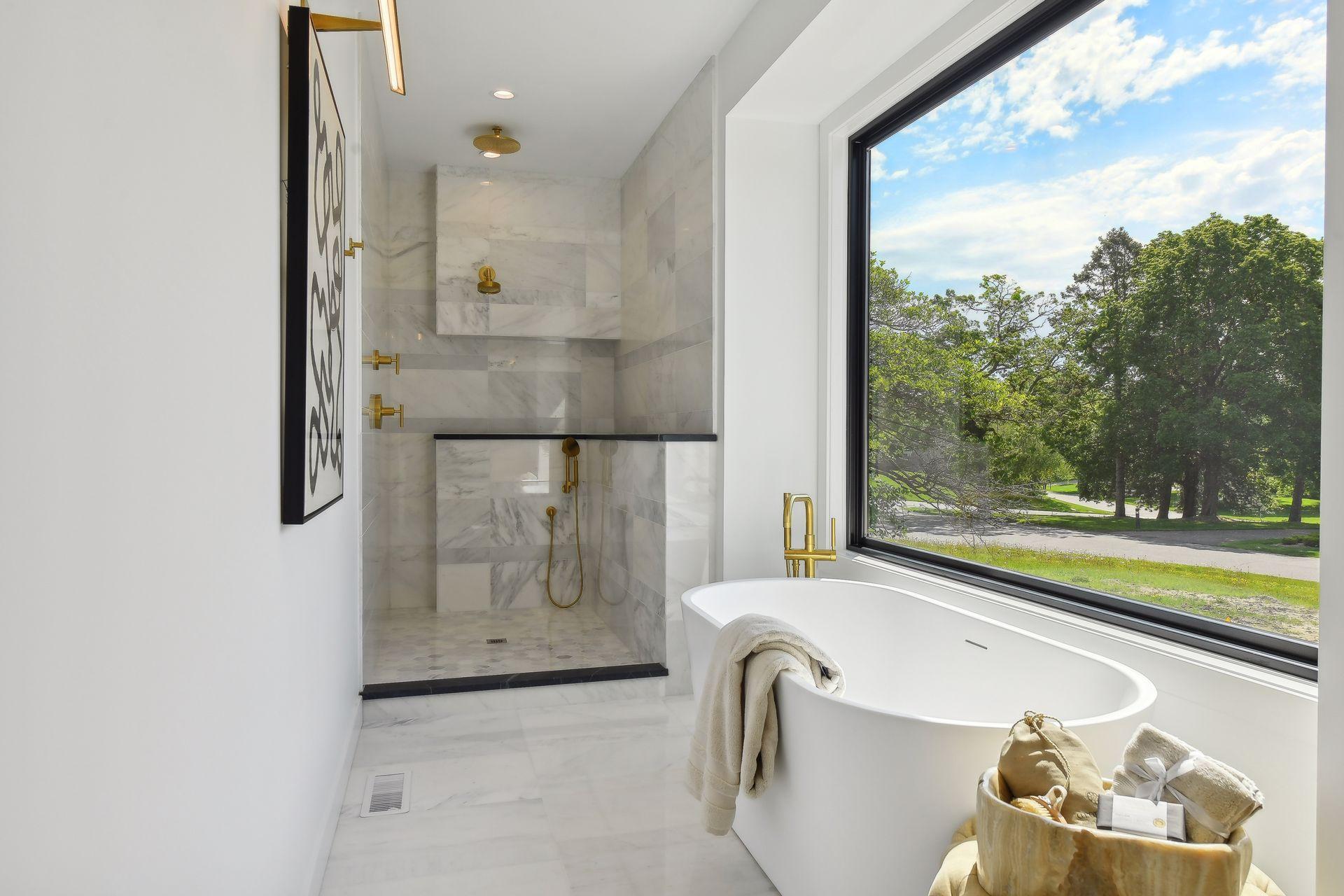 This is truly a spa experience featuring a luxury soaking tub with beautiful private views.